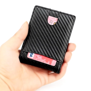 Slim carbon fiber wallet for men with multi-slot RFID blocking design in hand view