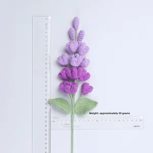 Macro shot of handmade crochet lavender bouquet with ruler showing length and purple details