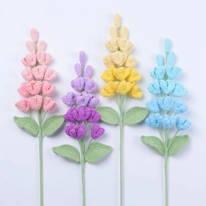 Detailed view of handmade crochet lilac bouquets in pink, purple, yellow, and blue