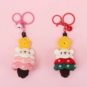 Handmade crochet bear Christmas keychain pendants in pink and red festive colors