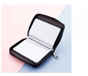 Detail of 20-slot leather card holder showing clear PVC inner slots and metal zipper