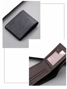 Detailed view of black litchi leather wallet showing card slots and transparent ID window