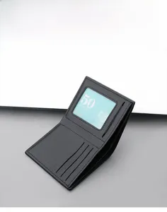 Detailed view of black bifold leather wallet showing card slots and smooth texture