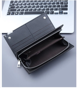 Detailed view of open leather wallet with multiple card slots and silver zipper pocket