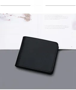Close-up of black Saffiano leather bifold wallet for men in a professional setting