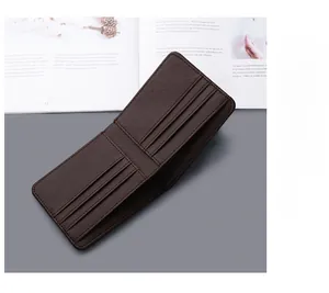 Detailed view of dark brown slim bi-fold wallet showing 6 interior card slots and fine stitching