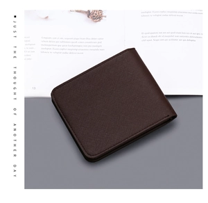Macro view of dark brown bifold wallet made of durable cross-grain leather and neat stitching