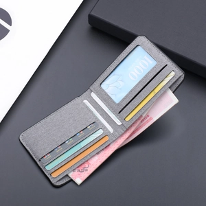 Portefeuille bifold en toile grise pour hommes avec coutures contrastées sur coffret