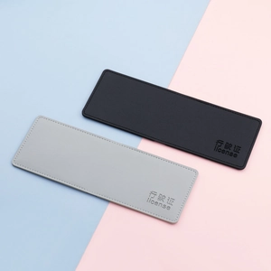 Sleek PU leather vehicle license holders in black and gray with detailed stitching