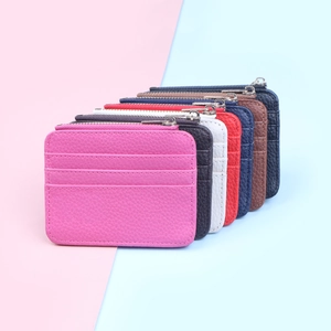 Detailed view of multi-color lychee pattern PU leather card holders with zip pockets