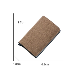 Brown canvas RFID blocking wallet with automatic metal card pop-up and dimensions