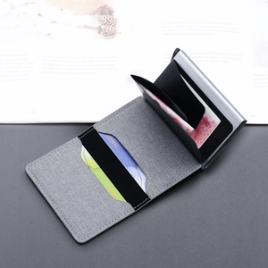 Slim RFID blocking canvas and metal wallet for men with pop-up card holder feature
