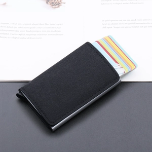Black RFID canvas card holder with metal frame and automatic pop-up slots for men