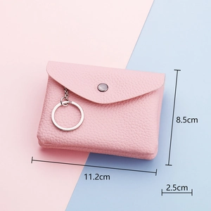 Pink minimalist faux leather coin purse and key holder with silver snap and dimensions