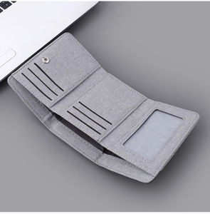 Internal layout of tri-fold canvas wallet featuring multiple card slots and an ID window