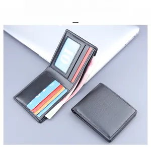 Close-up of black bifold wallet with leather texture, card slots and ID window display