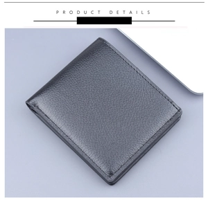 Detail of men's bifold wallet showing black litchi texture leather and double stitching