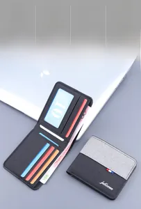 Close-up of canvas bi-fold wallet interior showing multi-card slots and bank note compartment