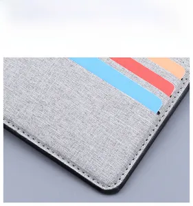 Detail of canvas wallet interior showing multi-card slots with colorful card inserts