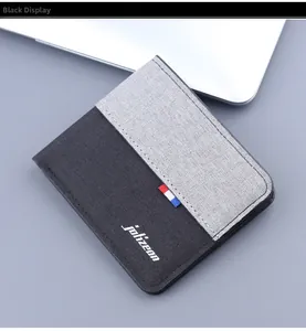 Detail of bifold canvas wallet in black and grey with jolizeon logo and tricolor ribbon