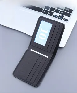 Detail view of the black bifold canvas wallet interior with card slots and money pocket