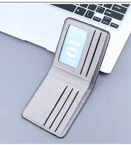 Detail view of the gray canvas wallet interior showing card slots and ID window