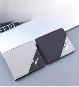 Close-up of slim canvas bi-fold wallets for men featuring a stylish color-block design