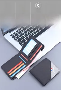 Detail view of canvas wallet interior featuring multiple card slots and cash pocket