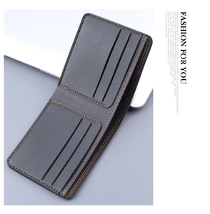 Detail of dark gray men wallet with contrast orange stitching and multi-card slots