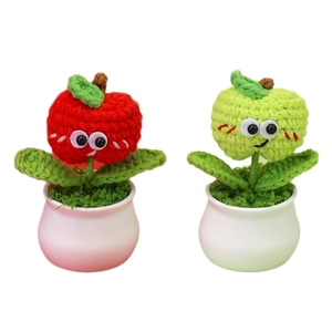 Handmade crochet apple desk plants with cartoon eyes in red and green knitted styles