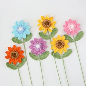 Detailed view of handcrafted crochet flower bouquet with sunflowers and daisies set