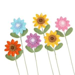 Set of six colorful handmade crochet sunflowers and flowers with green stems and leaves