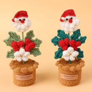 Handmade crochet Santa Claus potted plants with festive red and green knitted flowers