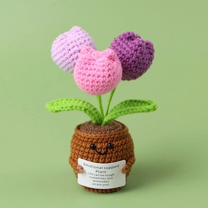 Crocheted emotional support potted plant with colorful flowers and motivational card