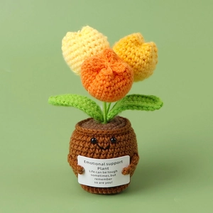 Detail of handmade crochet sunflower plant with emotional support card and cute pot