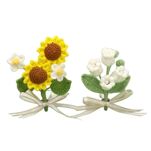 Handmade crochet sunflower and lily of the valley bouquet with a white silk ribbon bow