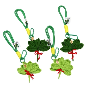 Handmade crochet green leaf pendant with lucky gold charm for bag or key accessory