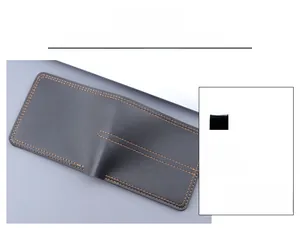 Detail of dark grey leather wallet featuring contrast brown stitching and bifold structure