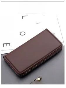 Macro detail of dark brown leather long zipper wallet for men with sleek business design