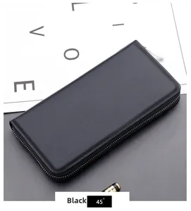 Detail of a black business leather long wallet for men with secure metal zipper closure