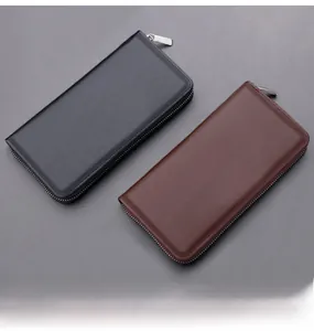 Close-up of premium leather men's long wallets in classic black and brown colors