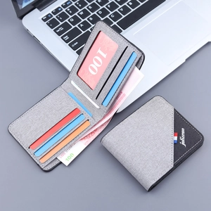 Short minimalist canvas bifold wallet for men with card slots and a sleek grey finish