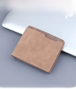 Close-up of brown frosted leather wallet showing fine stitching and internal card slots