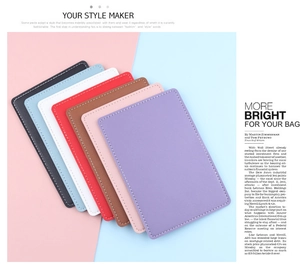 Detailed view of colorful slim card holders with high-quality stitching in seven colors