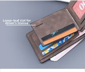 Detail of dark brown matte wallet showing internal card slots and removable license leaf