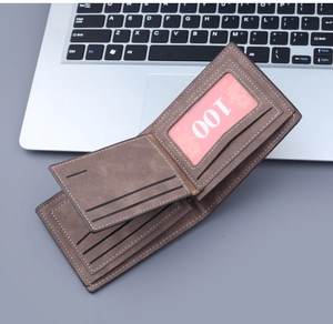 Detail view of coffee brown frosted leather bifold wallet with multi-card slots and stitching
