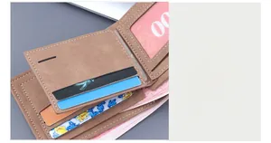 Detail of men's brown matte bifold wallet featuring detachable multi-slot card holder