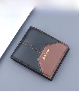 Detail of bifold wallet showing black and brown leather with contrast stitching and logo
