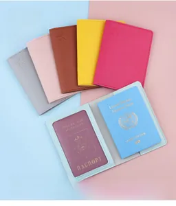Close-up showing various colors and internal slots of the PU leather passport holder