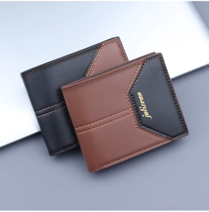 Detail of bifold men's leather wallet featuring V-shaped stitching and gold logo